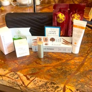 Neiman Marcus cosmetic bag or clutch with samples and IT eyebrow pencil